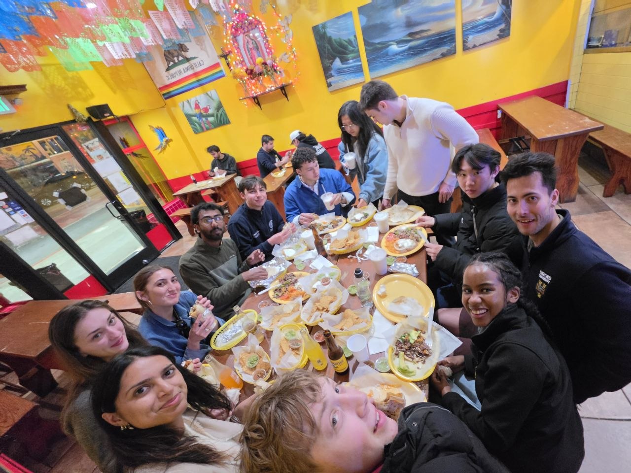 Global NeuroHack organisers and participants sharing a meal in San Francisco